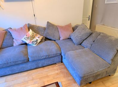 Grey corner couch incl. matching pouffe