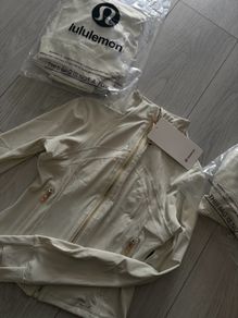 White and gold zip up