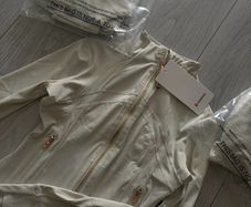 White and gold zip up