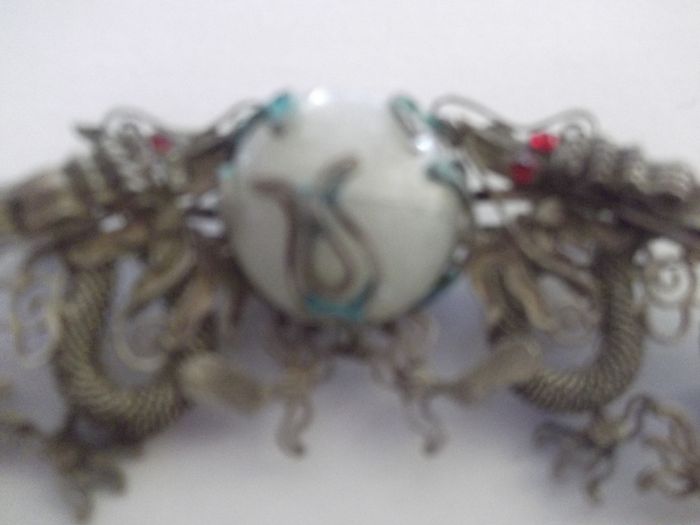 a vintage silver chinese filigree brooch