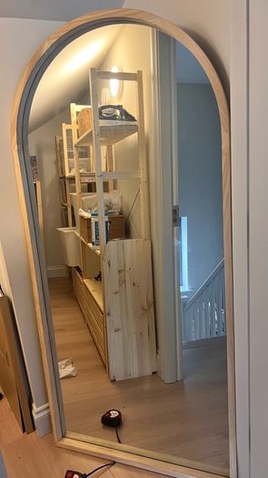 Wooden arched mirror