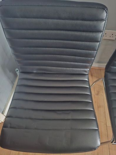 3 faux leather chairs