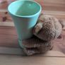 light green ceramic vase with teddy bear Image 2