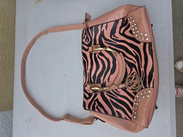 pink and black handbag