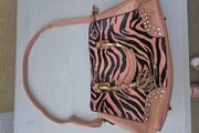pink and black handbag