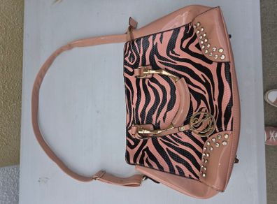 pink and black handbag