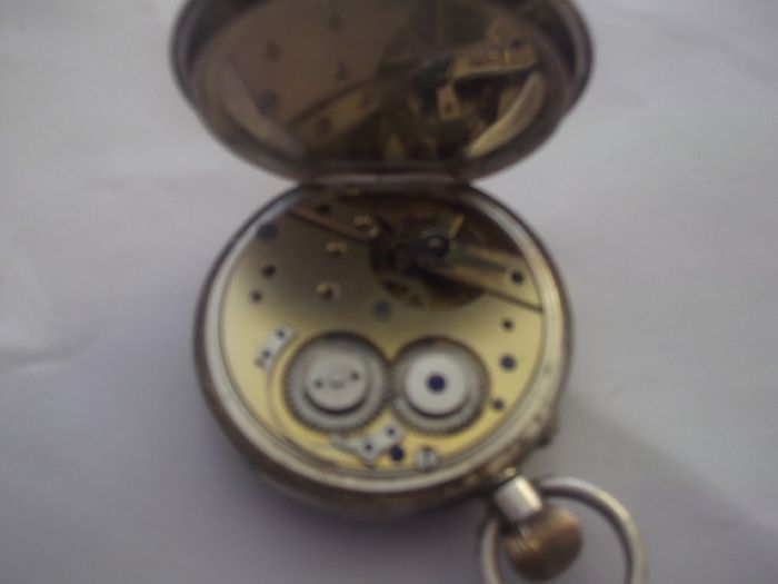 a antique open face solid silver pocket watch