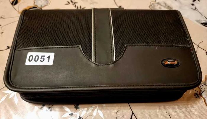 80 CD + Case. All CD's in perfect playable condition.