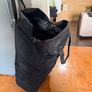 Two extra-large wheeled bags for organizing things; only one zipper doesn't work, but replacing it will make them like new. Image 2