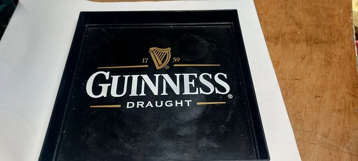 Guinness square drinks tray ,unusual item square ,buyer collects or pays postage, see pictures for condition ,used condition few marks, good solid condition,,sold as is .