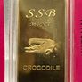 1avdp oz Fine 999 Brass Bullion Crocodile bar. Image 2