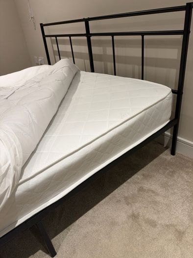 Bed with mattress