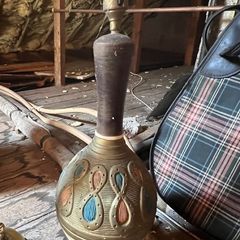 Vintage Mid-Century Modern "Genie Bottle" Chalkware Table Lamp dating from the early 1960s.