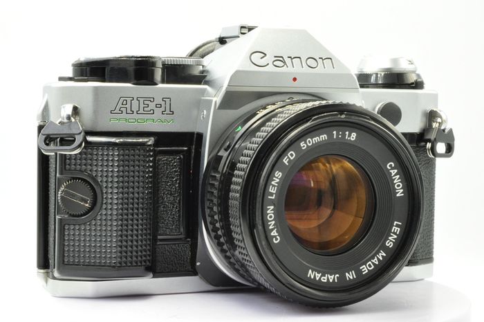 Canon AE-1 Program Silver/ Chrome 35mm SLR Film Camera with fast Canon FD 50mm f1. 8 FDn, Recently FULLY SERVICED and in Good Condition.