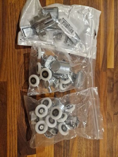 Shower door rollers