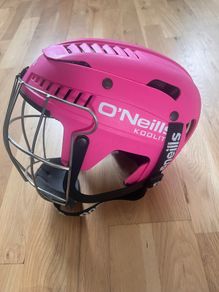 Pink girls hurling helmet