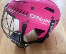 Pink girls hurling helmet