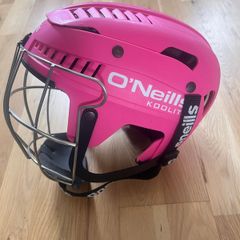 Pink girls hurling helmet