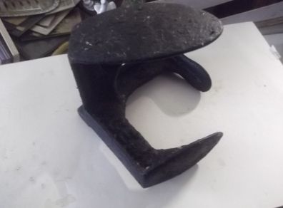 a antique cast irion shue maker  lass