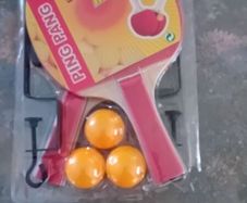 Table tennis bats x 2, balls and 2 grips for net