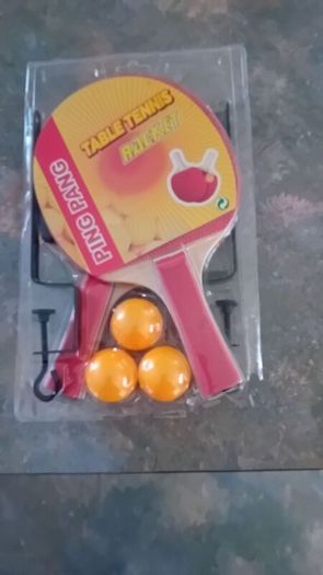 Table tennis bats x 2, balls and 2 grips for net