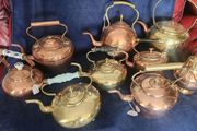 Vintage brass and cpper kettles. polished and beautiful.