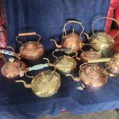 Vintage brass and cpper kettles. polished and beautiful.