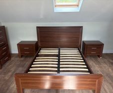 Bed frame with bedside lockers