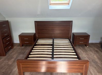 Bed frame with bedside lockers