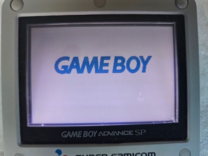 Nintendo Game Boy Advance SP -SNES Edition Shell + Games