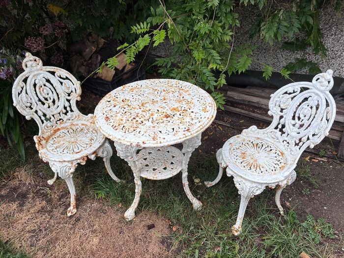 Cast iron table and chairs