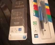 Parker pens and 12 large refills