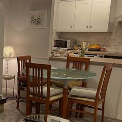 Dining table with glass top & 4 chairs