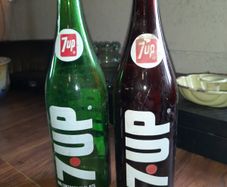 Pair Of Vintage 7UP Bottles
