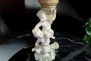 Ornate tall cherubic candle holder, D18
