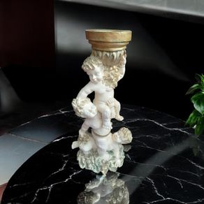 Ornate tall cherubic candle holder, D18