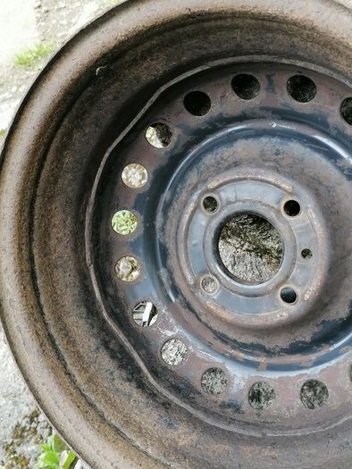 2 x steel rims 15", 4 stud, about 114mm ish from hole centre to the opposite home centre... Possibly fit a nissan etc