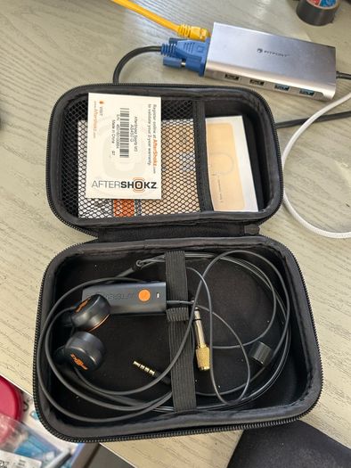 Aftershokz Bone Conduction wired.