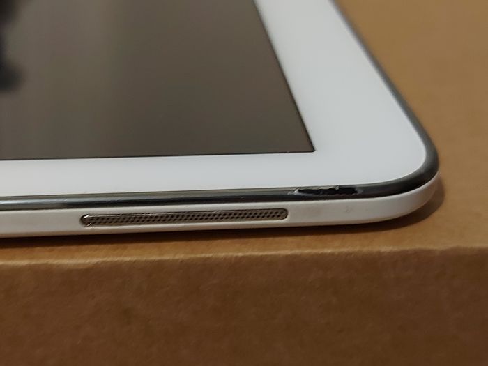 Samsung Galaxy Tab 4, Model SM-T530, 16GB, White, working great, in excellent condition and with a bunch of Family-children  movies