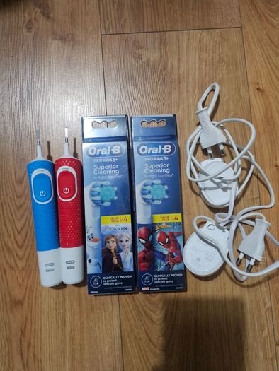 Oral b kids electric toothbrush x 2,brand new 8 heads and two charger