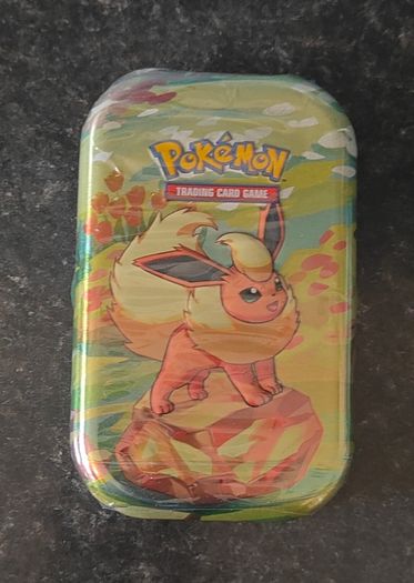 FREE Tracked Shipping. Pokemon Prismatic Evolutions Mini Tin
