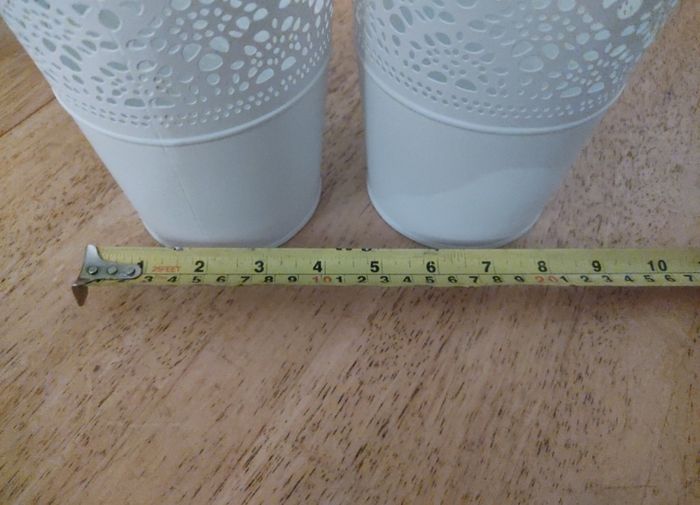 Two metal plantpots / plantpot holders