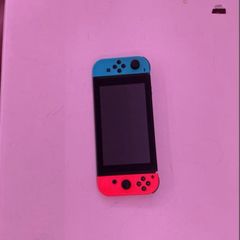 nintendo switch and 2 games