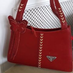 Stunning Red Bag with Butterfly Charm