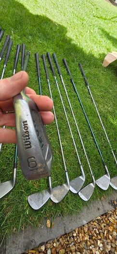 selection of golf clubs.