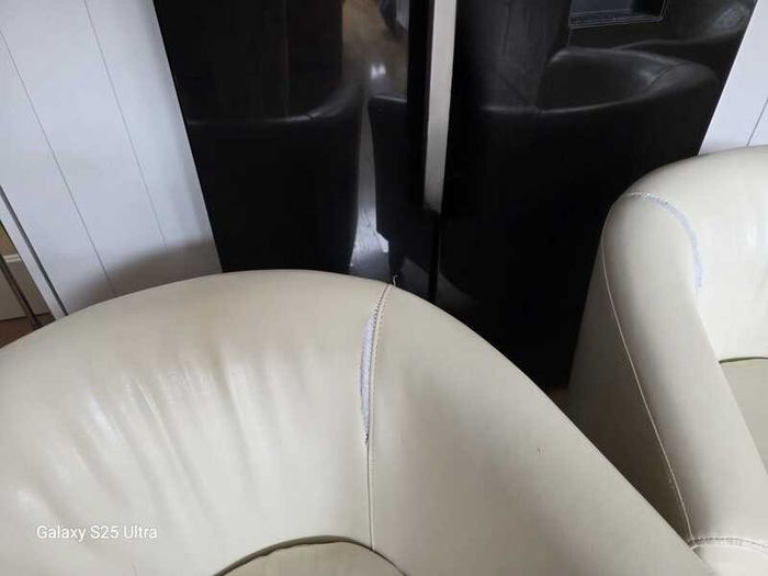 Three stylish leather arm chairs. Two require upholstery