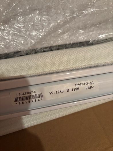 Pair of Cream Roman blinds