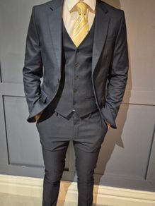 Mens River Island navy suit.