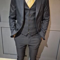 Mens River Island navy suit.
