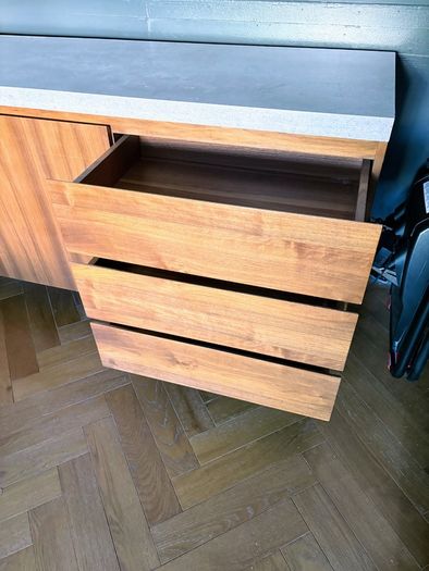 Modern walnut sideboard with stone top